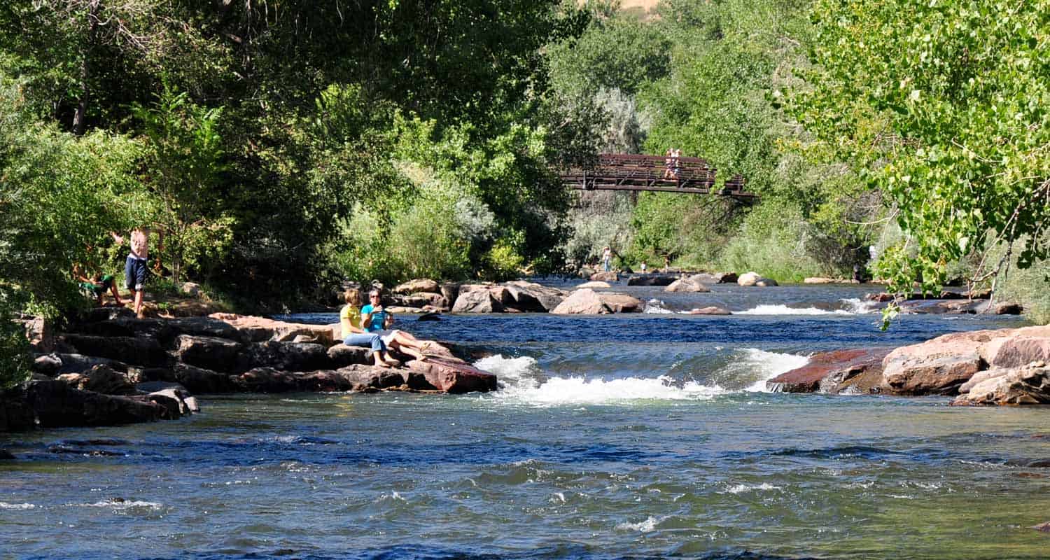 The whitewater park at Clear Creek in Golden, Colorado during the summer