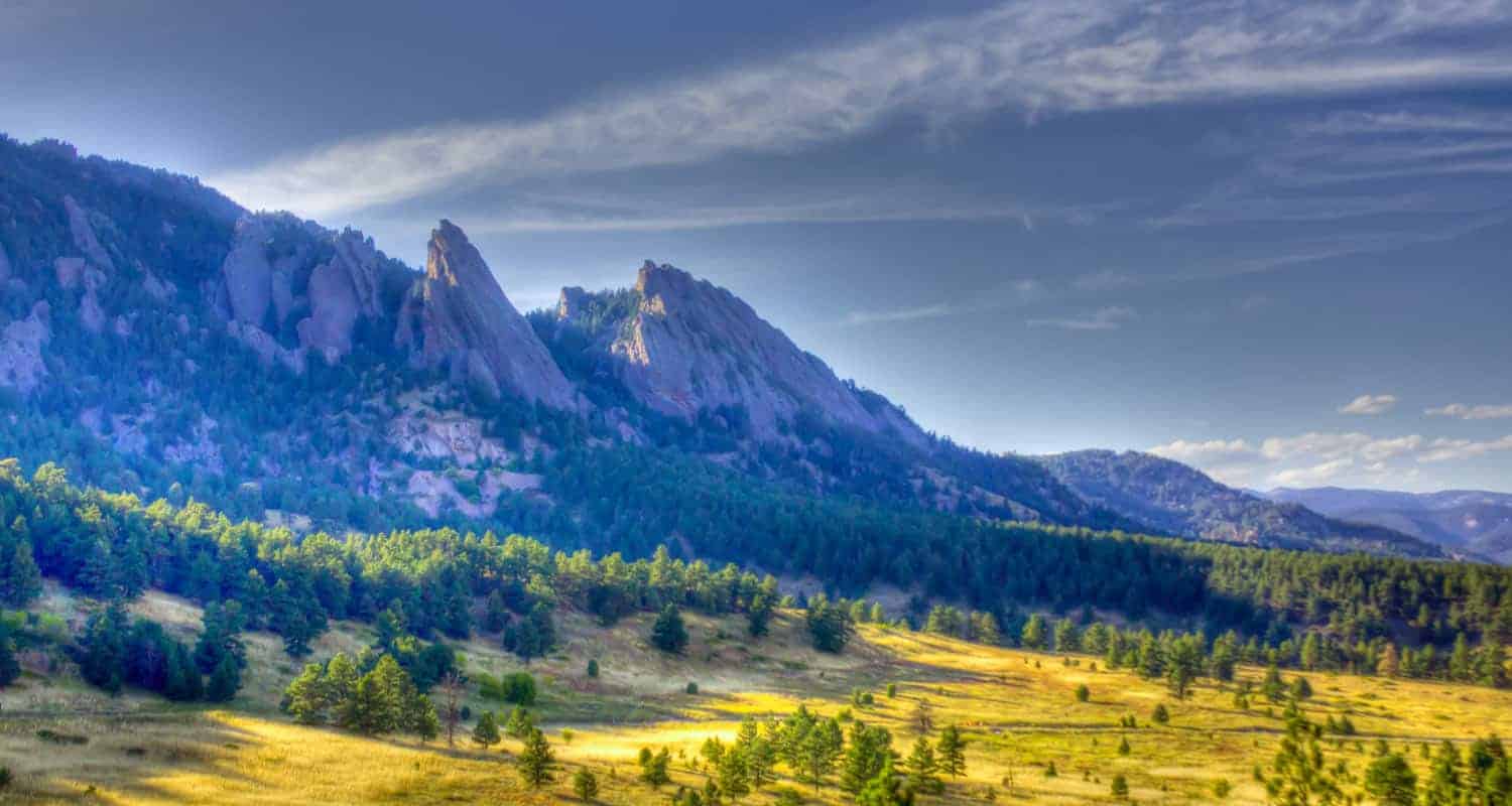 morning light on flatirons mountains near boulder taken from ncar on bear canyon loop hike